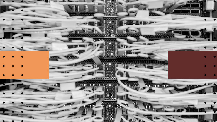 Closeup of cables on the back side of a server rack